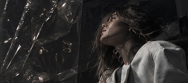 Portrait with textured material and sculptural tailoring